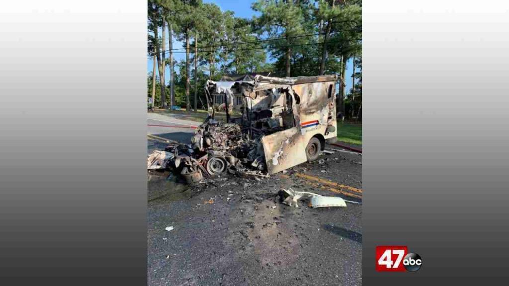 Mail truck catches on fire following head-on collision