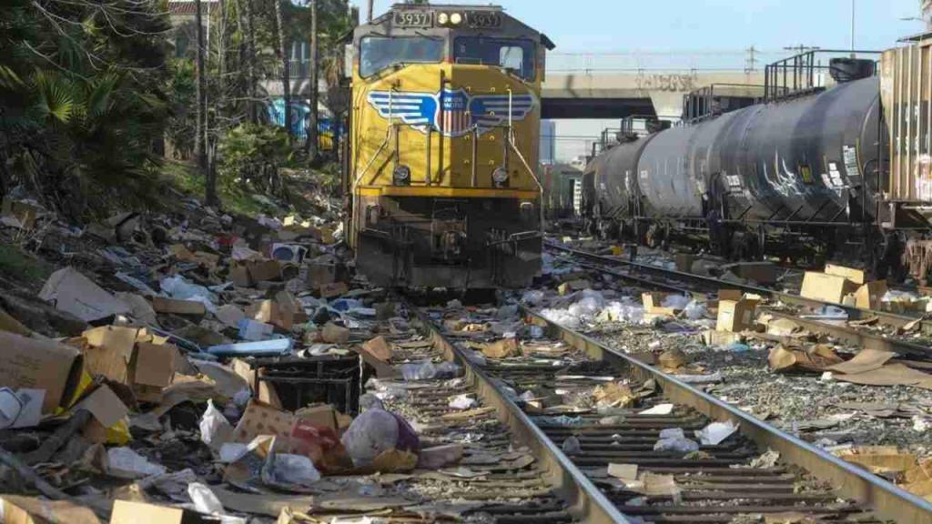 Thieves Raiding Cargo Containers, Stealing Packages On Downtown Section Of Union Pacific Train Tracks