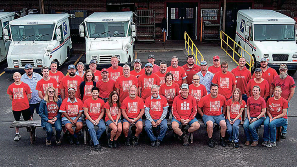 Postal employees go RED for co-worker deployed overseas