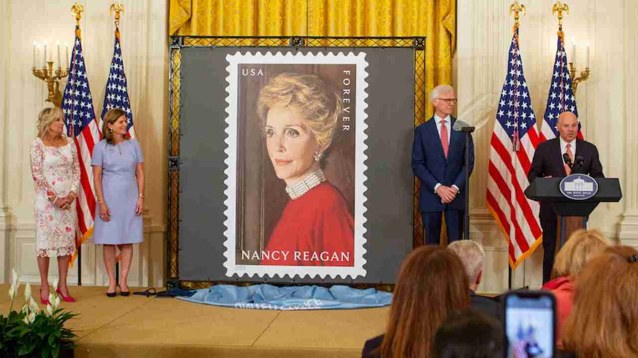 USPS Unveils Nancy Reagan Stamp with First Lady Jill Biden.L to R:-First Lady Jill Biden-Ann Peterson, niece of Nancy Reagan-Fred Ryan, chairman of the Ronald Reagan Presidential Foundation-Postmaster General Louis DeJoy