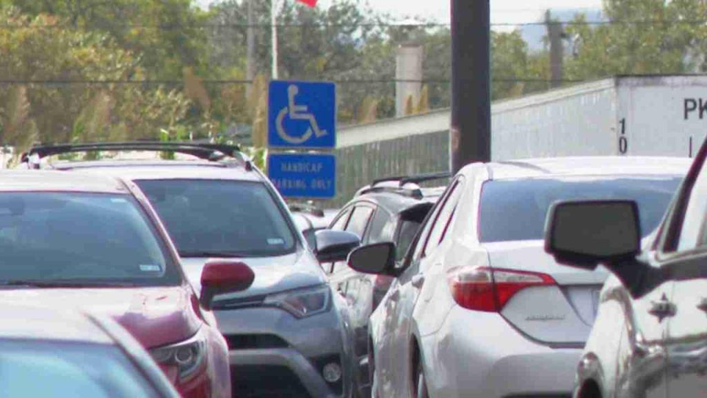 Disabled postal workers claim they're being forced to park farther away