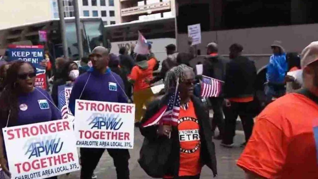 Postal workers rally in SW DC ahead of USPS board of governors meeting Tuesday