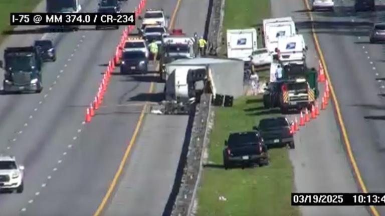 USPS workers rally to recover mail after semi-truck flip on I-75 in ...