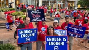 Hundreds of postal workers rally against privatization outside Orlando City Hall