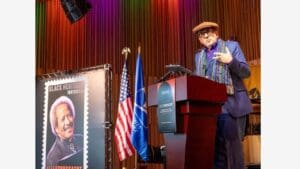 Elvis Costello helps dedicate a stamp honoring Allen Toussaint