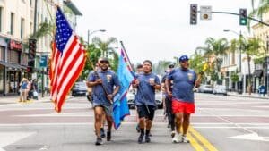A Postal Police officer runs for Special Olympics