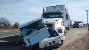 USPS mail carrier seriously injured in crash with a big rig
