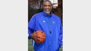 After a pro basketball career, this postal employee became a youth coach