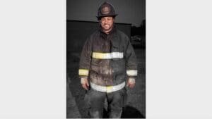 This postmaster serves his community as a volunteer firefighter