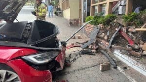 Wealthy Calif. town still reeling from Tesla destroying post office