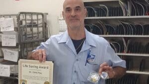 Hudson mail carrier saves 91-year-old’s life, honored with award