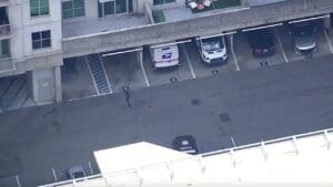 Bystander exchanges gunfire with armed robber targeting postal worker in Buckhead