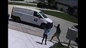 Video: Gun-wielding masked robber steals universal key from postal worker in Poinciana
