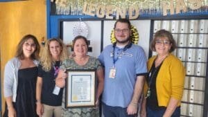 Community celebrates longtime Buxton Postmaster Donna Parker as she retires after 34 years of service