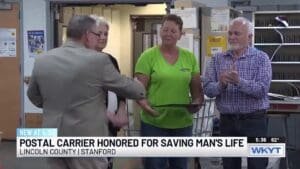 Postal worker honored for saving man’s life on her route