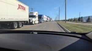 'Trucks as far as the eye can see.' Holiday mail hits traffic around USPS distribution center