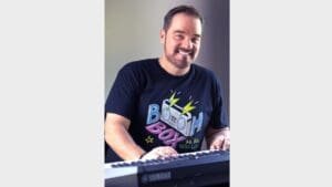 This postal employee dedicates downtime to traveling and performing with his ’80s tribute band