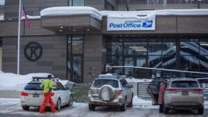 A small staff among hundreds of packages