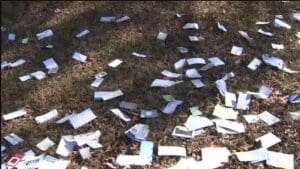 Truck spills piles of mail on side of I-285 in Cobb County