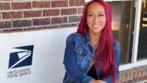 Flint letter carrier honored for saving girl in dog attack