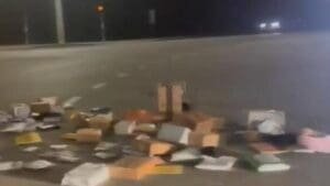 USPS customers left in limbo after 200 packages are dumped in middle of road