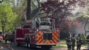 Mail carrier calls 911, helps save NJ mom, child from house fire