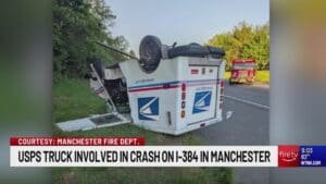 Overturned mail truck shuts down I-384 in Manchester