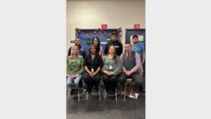 These postal employees helped a co-worker who had a heart attack get emergency care