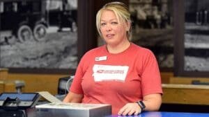 Clerk serves customers with a smile at Whitefish post office