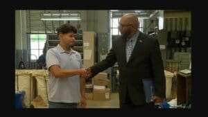 Milan postal worker answers call for help