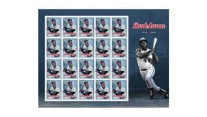 USPS Unveils Henry “Hank” Aaron Stamp On 50th Anniversary of Eclipsing Homerun Record