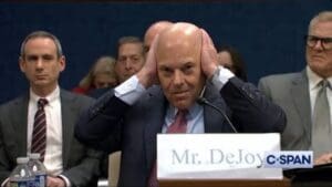 Postmaster General Covers Ears During Oversight Hearing