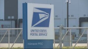 Why are there delays at the USPS hub in Indianapolis?