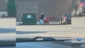 Video - Postal carrier throws away mail into NN dumpster