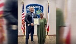 Mail carrier recognized for "helping save woman's life" during pit bull attack