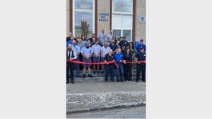 A Post Office reopens following a flood