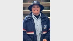 This postal employee came to the aid of a woman who was dizzy and vomiting