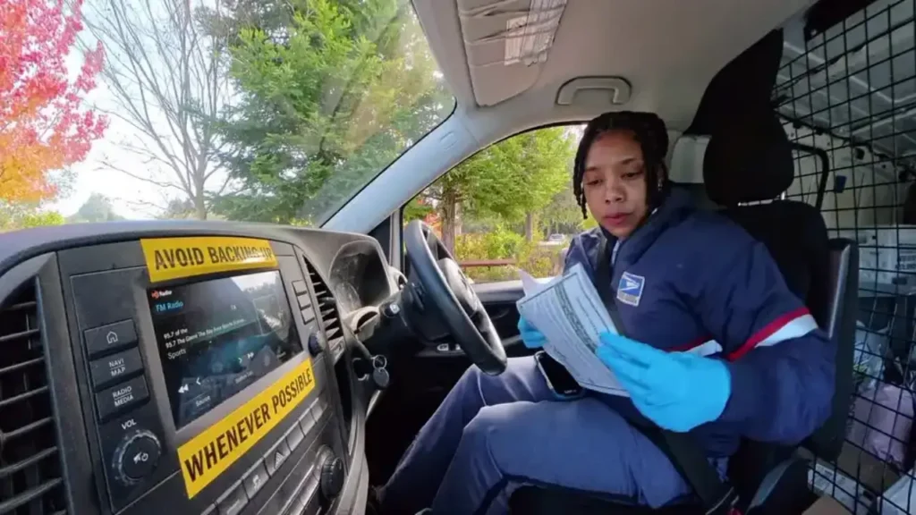Smiling Saratoga postal carrier delivers mail and holiday cheer