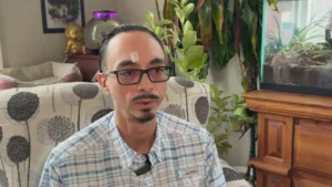 Colorado man says on-duty mailman was "going postal" during attack over parking