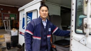 This letter carrier enjoys interacting with his customers each day