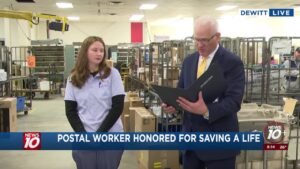 DeWitt mail carrier honored for saving elderly woman stuck in cold after fall