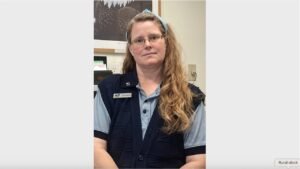 This postal clerk enjoys working in a small-town Post Office
