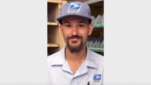 This postal employee saw flames coming from a house and took action
