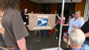 Beloved postal worker in comfort care gets a mail truck parade near hospital