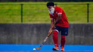 This USPS employee plays field hockey all over the world
