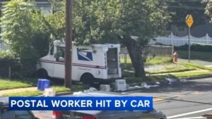 Critically injured USPS worker loses leg after being hit by car